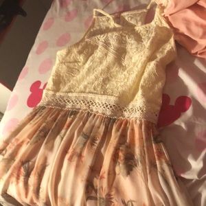 A white lace dress with flowers